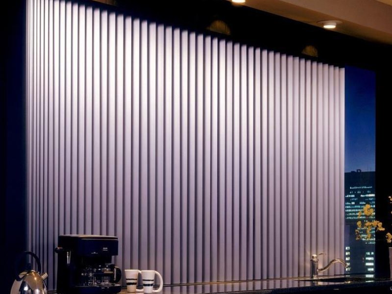Perforated Vinyl vertical blinds with all washable vinyl texture.