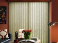Timberwood Vinyl vertical blinds with all washable vinyl texture.