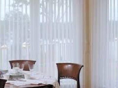 Illuminate sheer veritcal by Bali blinds.
