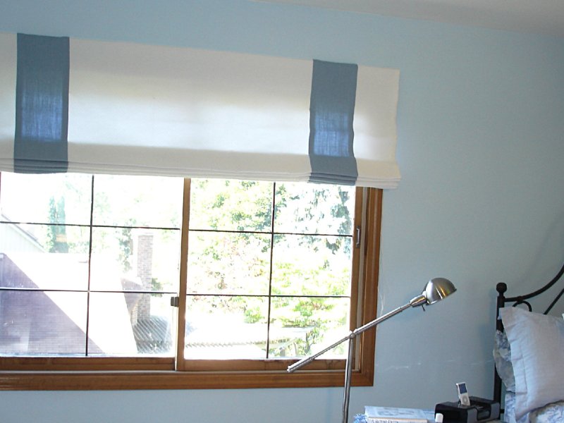 Bali  Blinds Fabric Roman Shade  style Damask brings the leather look to Bali Roman shades.