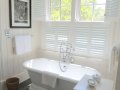 Waterproof shutters by Norman for baths